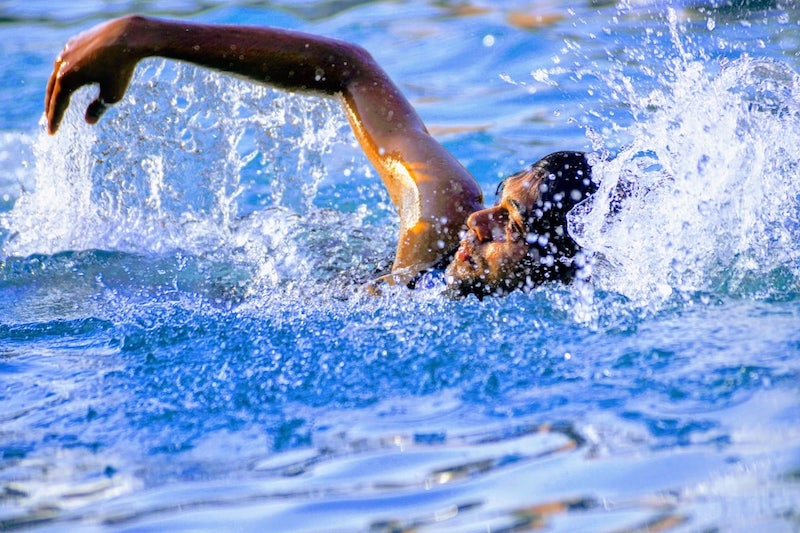 Man Swimming Freestyle